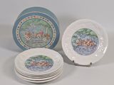 three plates with winnie the pooh designs are stacked on top of each other