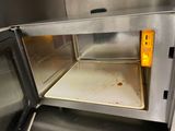 a microwave that has some food inside of it