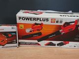 two powerplus corded chainsaws are sitting on a table