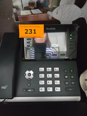 a picture of a phone with a picture of a person on it