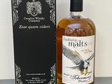une photo d'une bouteille de whisky de malt de 20 ans d'âge à côté d'une boîte
