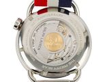 a silver watch with a red, white, and blue band