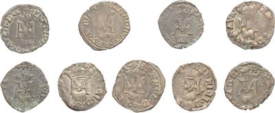 a group of six ancient roman coins on a white background