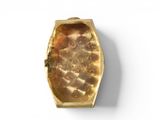 a close up of a gold ring on a white surface