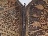 an open book that has a picture of a bird on it