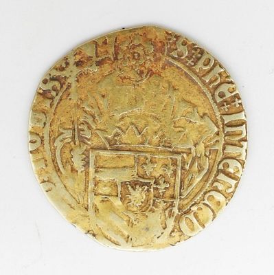 l'image d'une pièce d'or sur laquelle figurent des armoiries