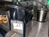 a coffee maker sitting on a counter in a kitchen