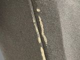 a close up of a bag with a hole in it
