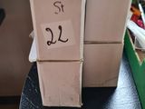 two boxes that are sitting on top of a table