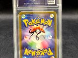 a close up of a pokemon trading card in a clear case