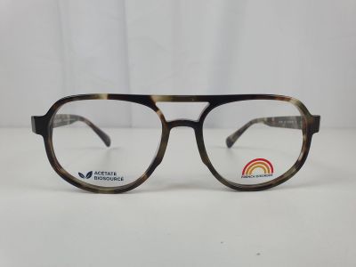 a pair of glasses sitting on a white surface