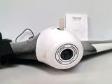 a small camera sitting on top of a table