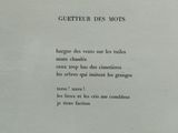 an old black and white photo of a poem written in french