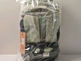 a bag of clothes that is sitting on a table