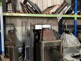 a room filled with lots of different types of furniture
