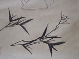 a drawing of a teapot and bamboo plant on a table