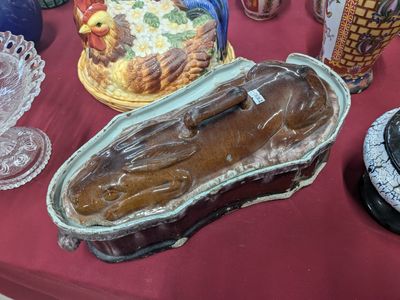a table that has many different types of glassware on it