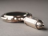 a silver object that is laying on a table