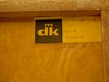 a close up of a sign on the door of a bathroom