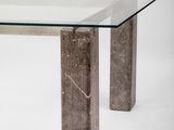 an image of a glass table with a marble base and a glass top