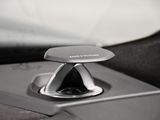 a close up of a car dashboard with a phone holder on it