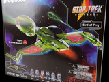 a box that has a model of a star trek ship in it
