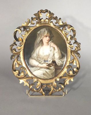 la photo d'une femme en robe de mariée, dans un cadre