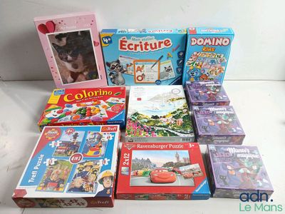many children ' s books and games on the table