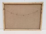 an old picture of a wooden frame with a string hanging from it