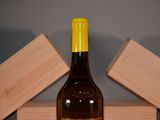 a bottle of wine that is sitting on a table