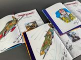 three children ' s books with pictures of military planes on them
