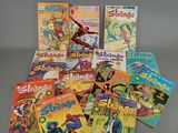 a lot of comic books on the table