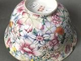 a vase with a flower pattern on it on a table