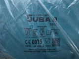 a plastic bag with a blue ball inside of it