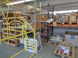 a large warehouse filled with lots of boxes and pallets