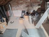 a room that has a lot of tools on the floor