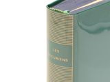 a green book with a gold border on it