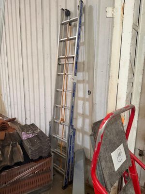 two pictures of a room with a ladder and a pile of wood