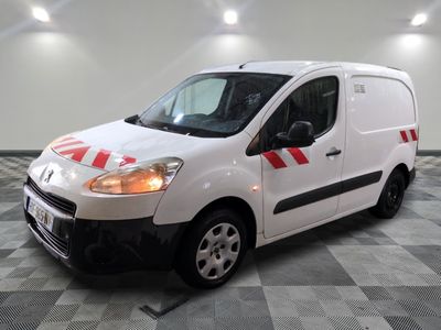 a picture of a white van parked in a garage