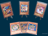 four cards of different types are displayed on a stand