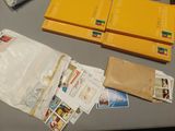 a table with a bunch of postcards and other items on it