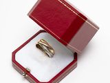 a ring in a red box on a white surface