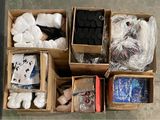 many boxes of assorted items sitting on the floor