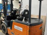a fork lift truck parked in a warehouse