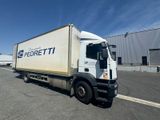 a semi truck that is parked in a parking lot