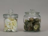 two glass jars with different types of food in them