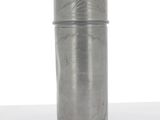 a close up of a metal container on a white surface