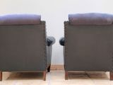 pair of mid - century modern leather club chairs in good condition for sale