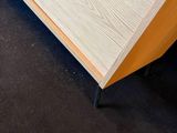an image of a white and wood cabinet in a living room