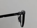 a close up of a pair of glasses with the word dior on it